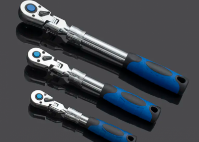 Retractable head ratchet wrench