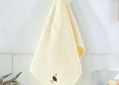   Solid color embroidered face towel