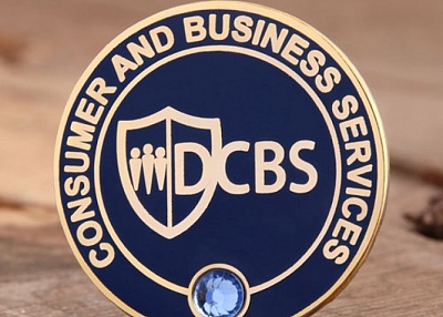 DCBS custom enamel pins